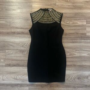 A’gaci black mini dress with gold detail